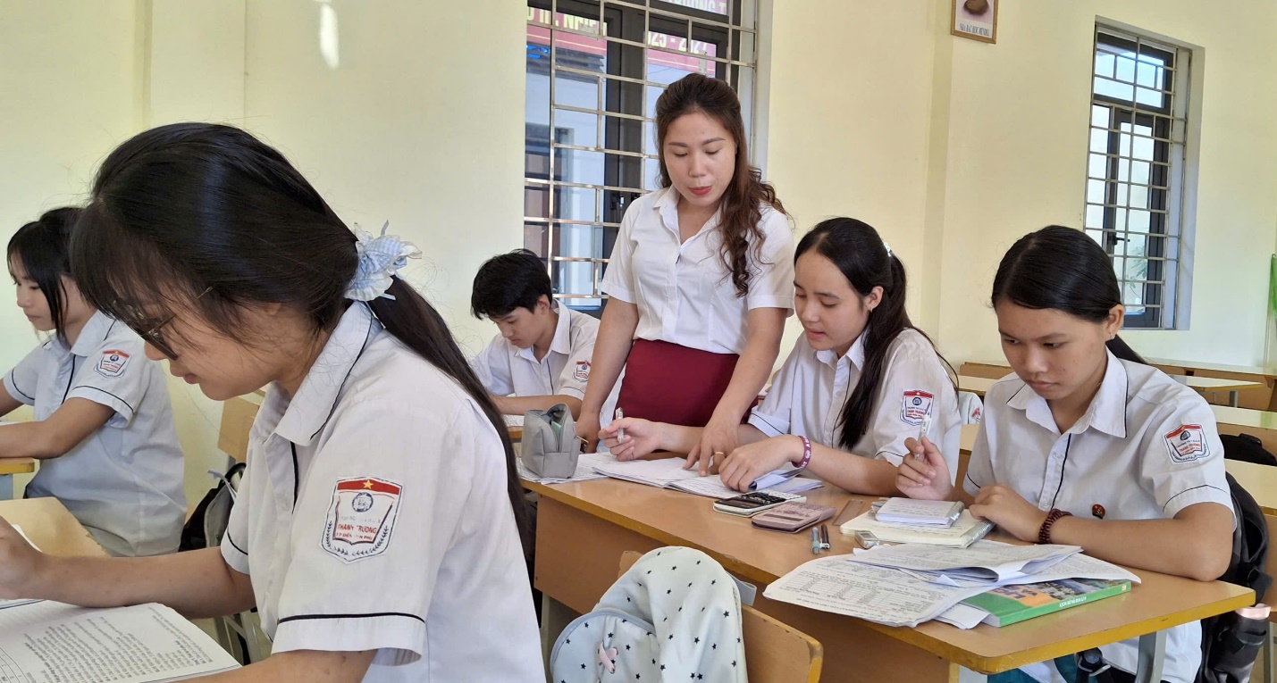 'A group of students in a classroom
Description automatically generated'